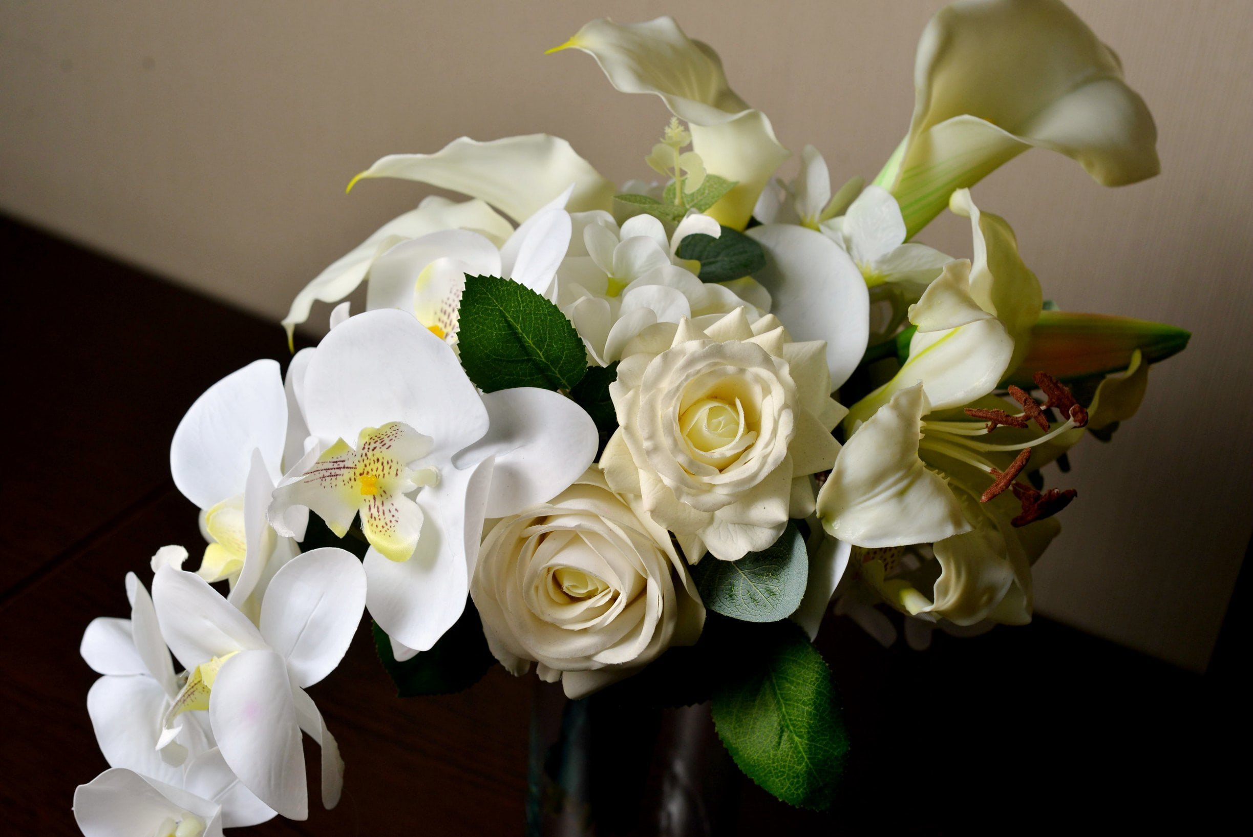 Букет невесты каллы орхидеи и розы