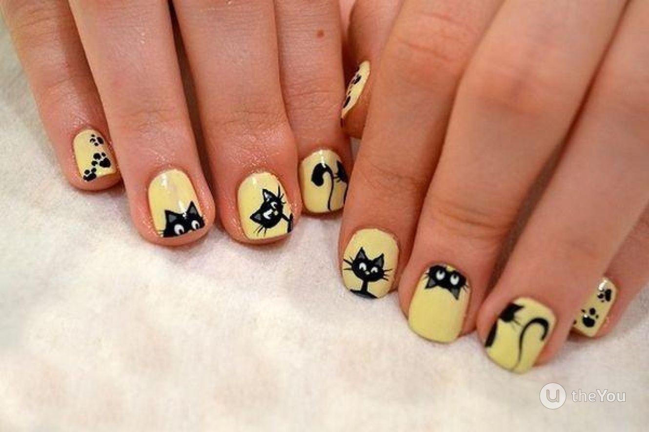 Маникюр кошки на желтых ногтях